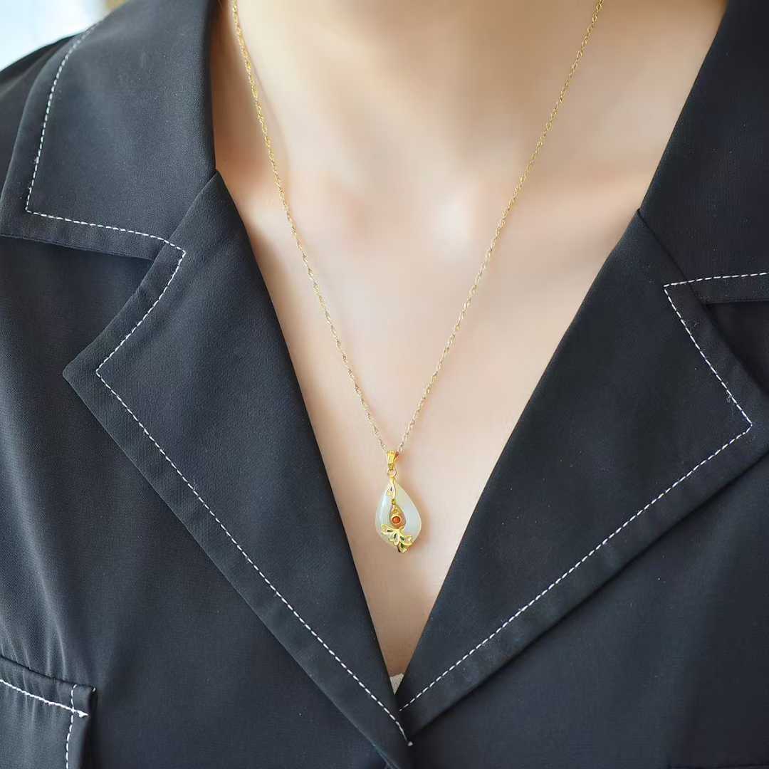 925 Silver Inlaid Hetian Nephrite Hollowed-Out Water Drop & Phoenix Pendant