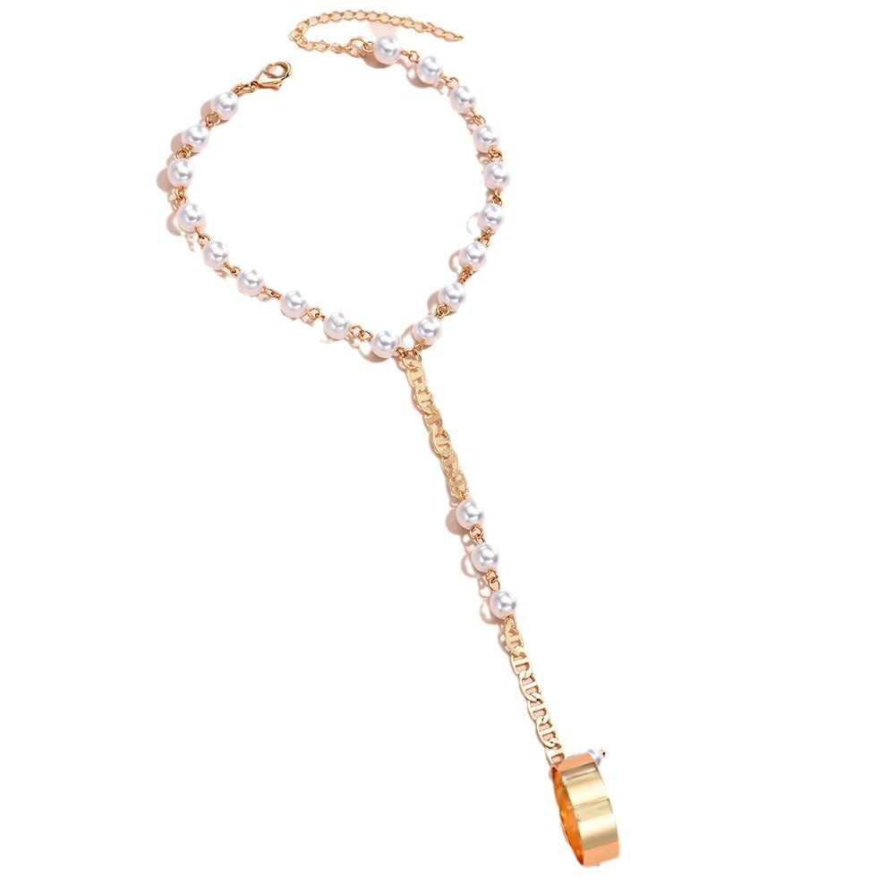 Simian pearl chain finger bracelet