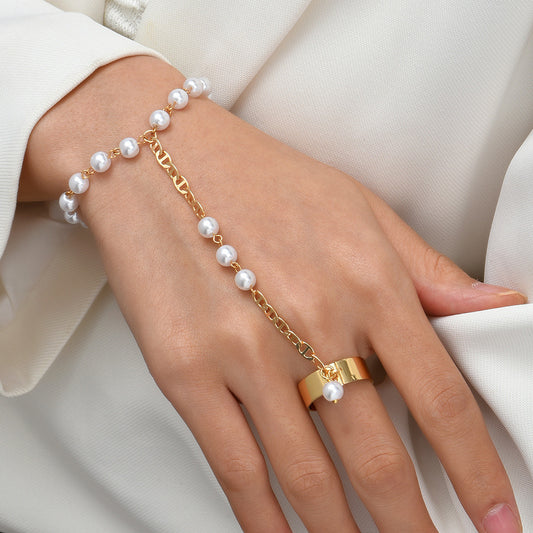 Simian pearl chain finger bracelet