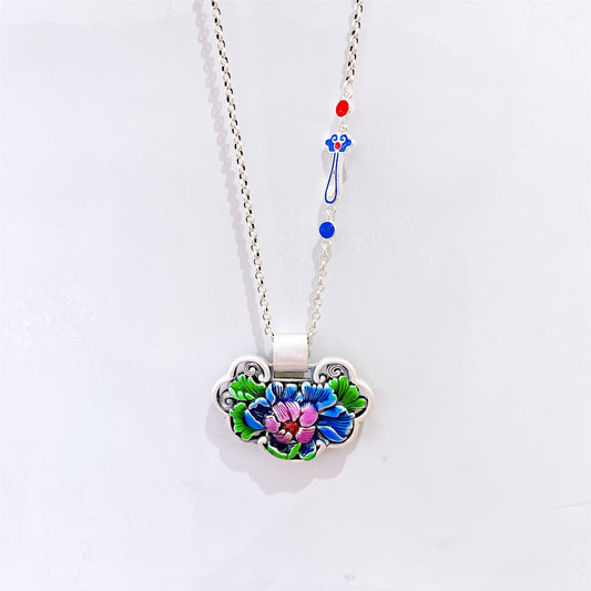 Close-up of carved peace lock design on Chinese style pendant