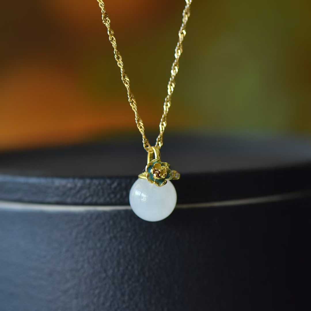 Detailed view of minimalist elegant design with Hetian white jade beads and prosperity symbols