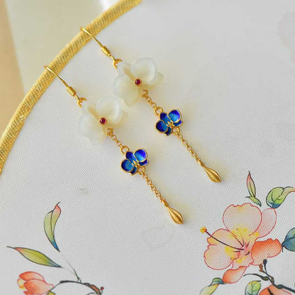 Detailed dragon scale carving on Hetian jade - premium silver earrings
