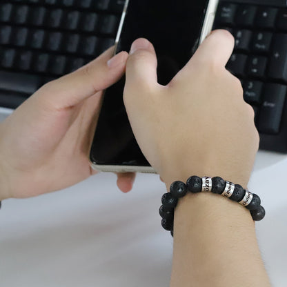 Men's engraved lava stone bead bracelet