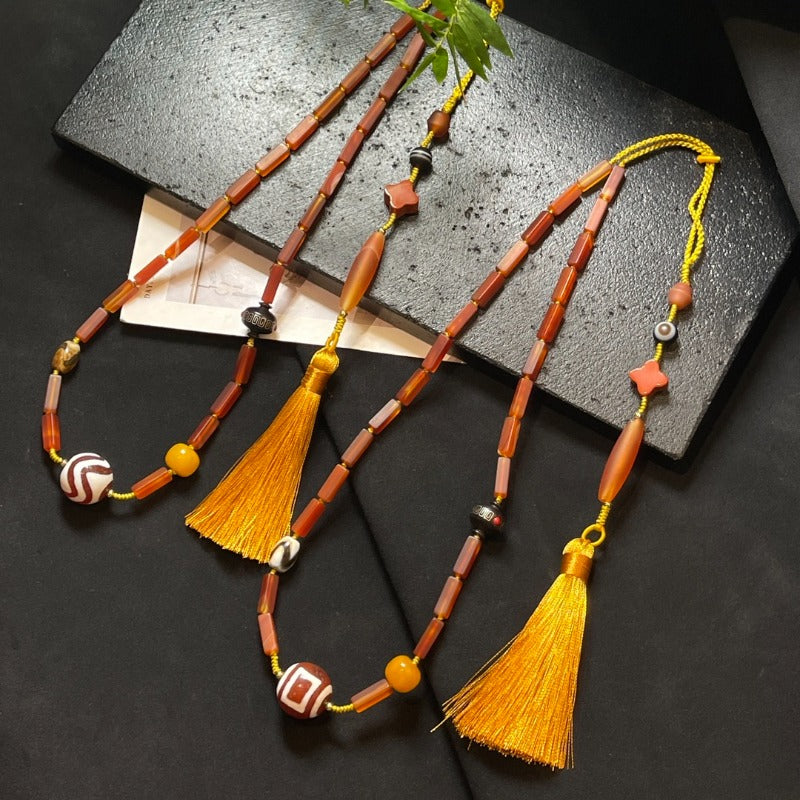 قلادة الترقوة من خرز دزي العصري من العقيق