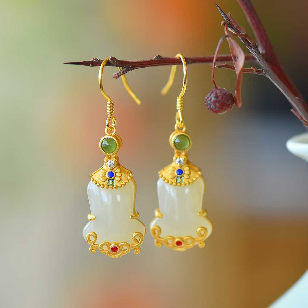 Detailed view of Triumph at First Try motif on ancient-style Hetian nephrite jewelry"