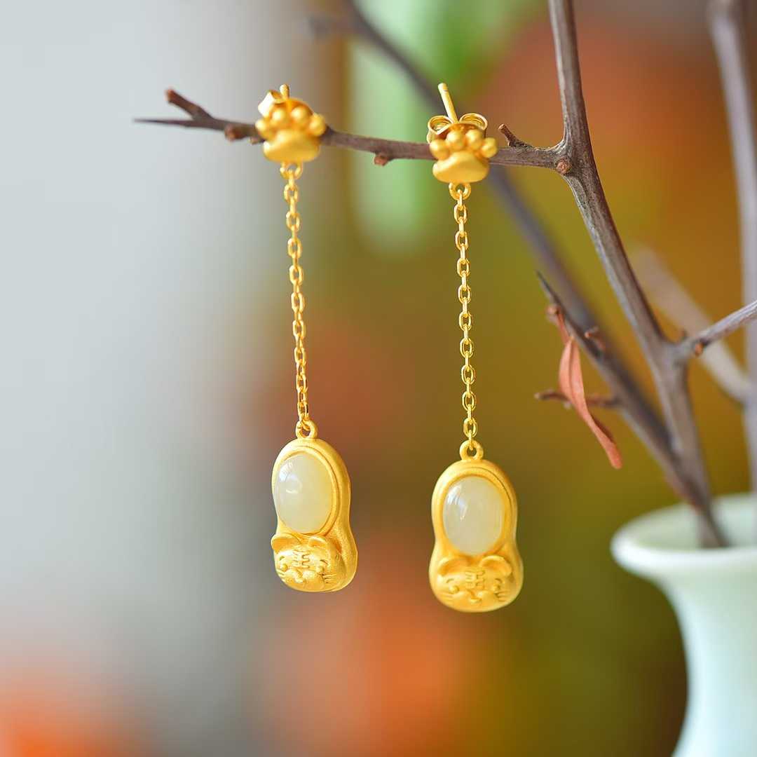 Detailed view of attract wealth and gather blessings motif on Hetian nephrite jewelry