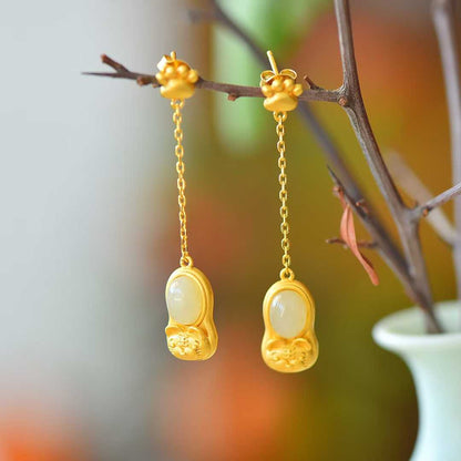 Detailed view of attract wealth and gather blessings motif on Hetian nephrite jewelry