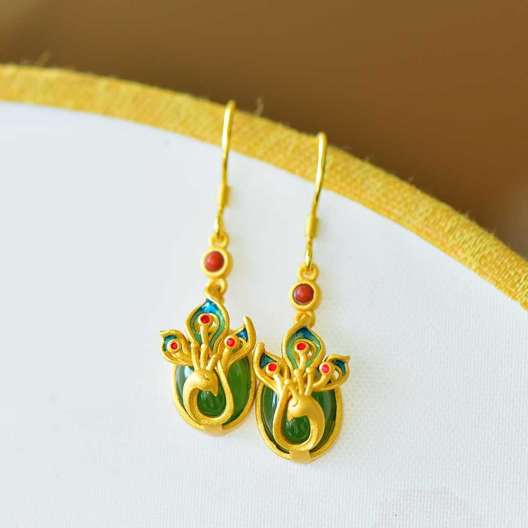 Detailed view of phoenix rebirth motif on traditional Hetian nephrite jewelry