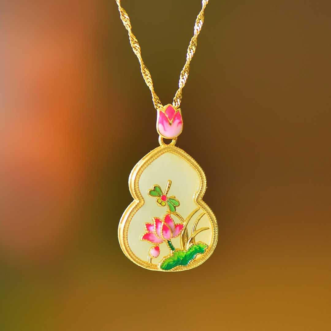 Close-up of butterfly and flower design with gourd motif on Hetian jade pendant