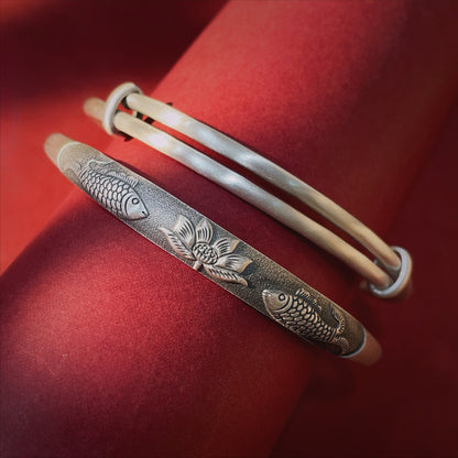 Close-up of lotus circle pattern on sterling silver bracelet

