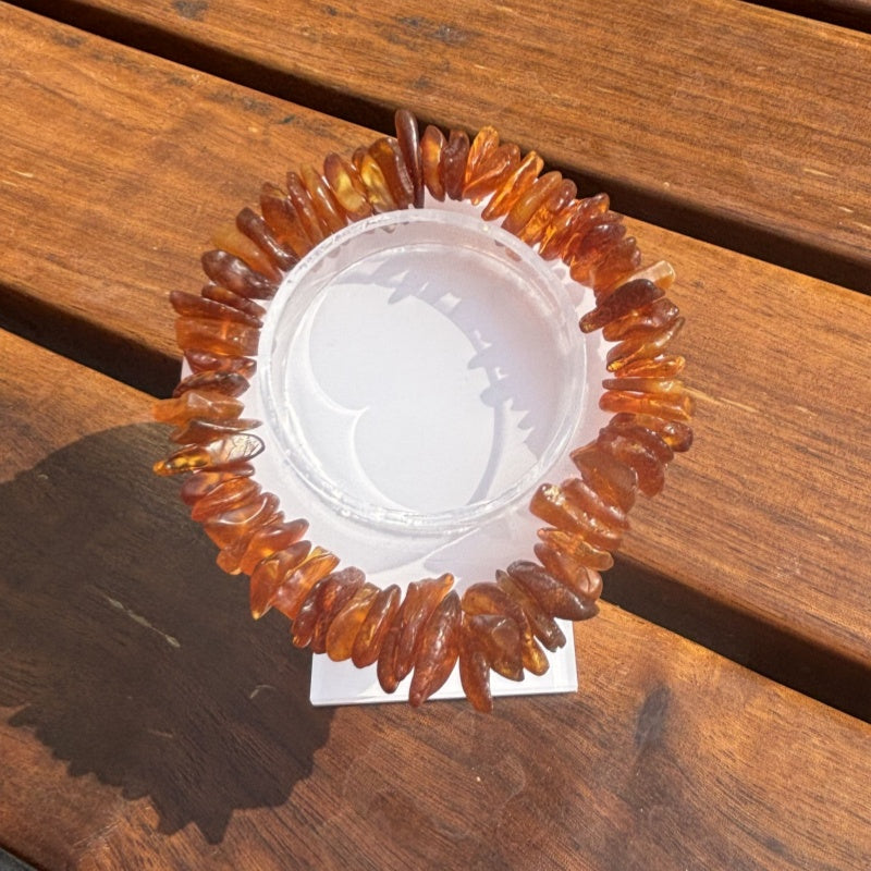 Sea drifting rough stone with the shape of the bracelet