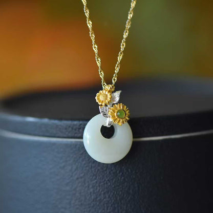 Close-up of hollyhock flower design Hetian jade pendant from Twelve Flower Gods series"