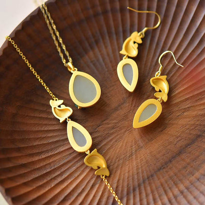 Premium Hetian nephrite enamel jewelry with lotus and fish representing annual abundance