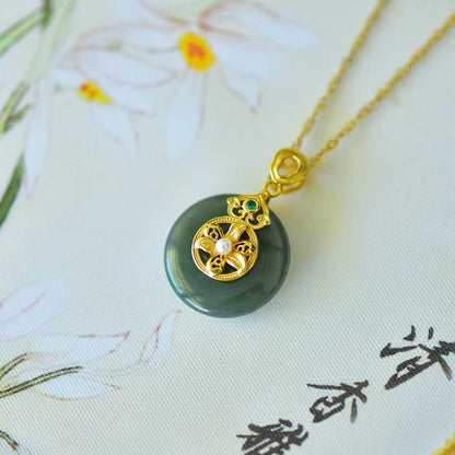 925 Silver Inlaid Hetian Nephrite "Peace Buckle & Lily" Pendant