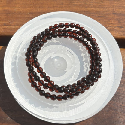 Blood amber three-ring bracelet