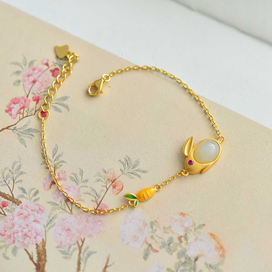 Elegant vintage silver inlaid Hetian jade rabbit set featuring luxurious thick matte gold