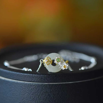 Close-up of daffodil flower design Hetian jade pendant from Twelve Flower Gods series"