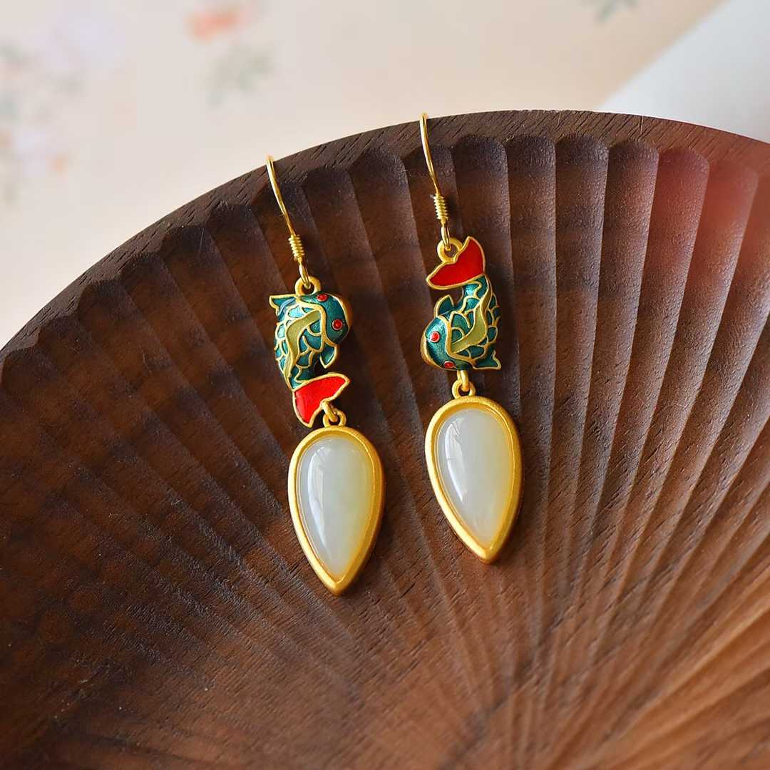 Detailed view of Year After Year Abundance motif on Hetian nephrite and enamel jewelry