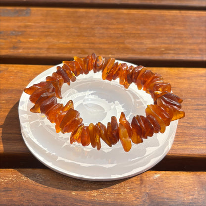 Sea drifting rough stone with the shape of the bracelet