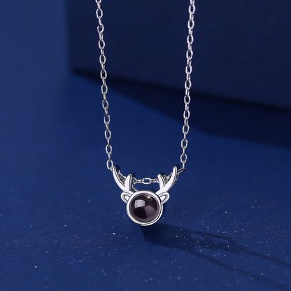 Collar de asta de alce con proyección fotográfica 