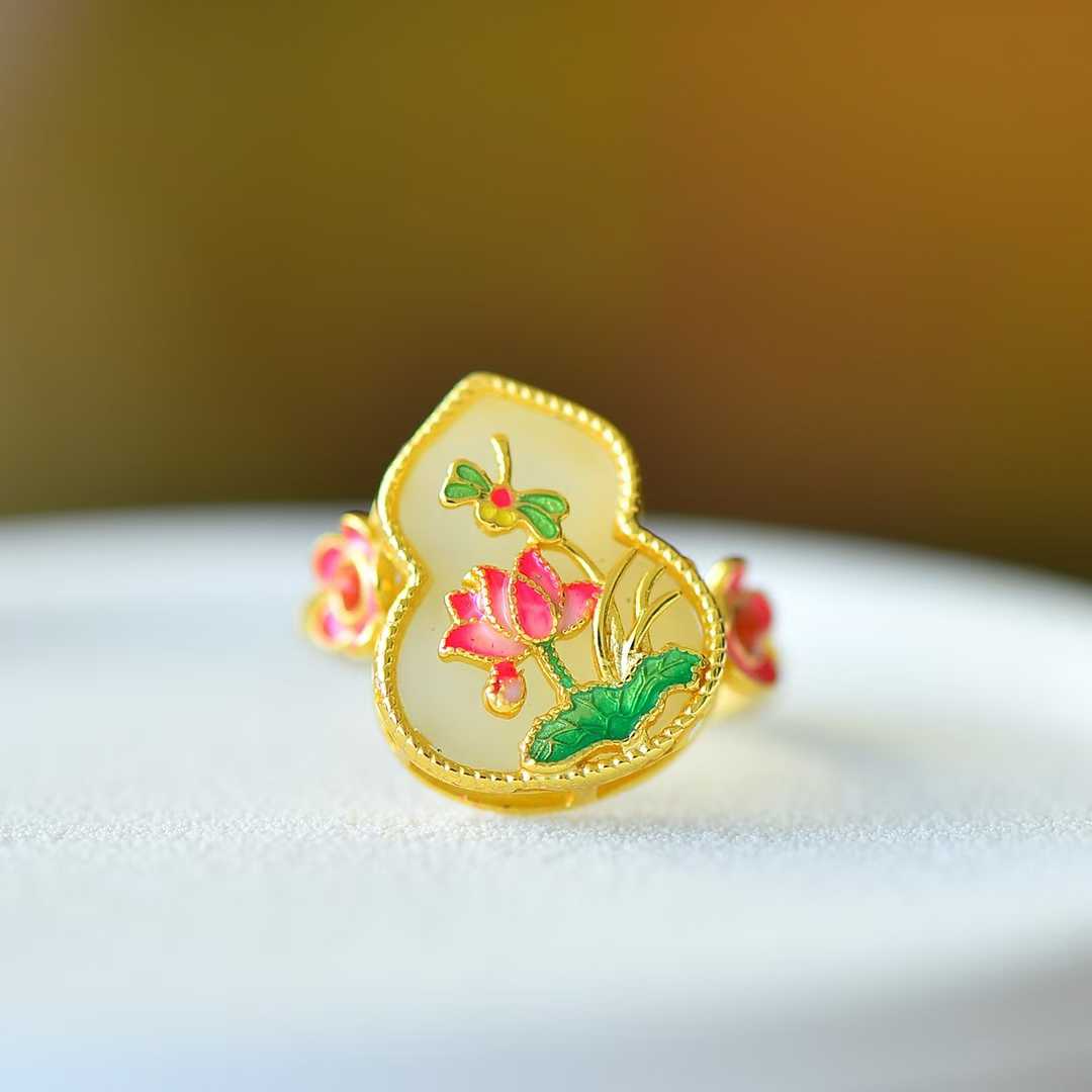 Detailed view of romantic butterfly-lover pattern with auspicious gourd on Hetian nephrite jewelry