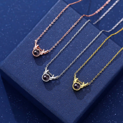 Collar de asta de alce con proyección fotográfica 