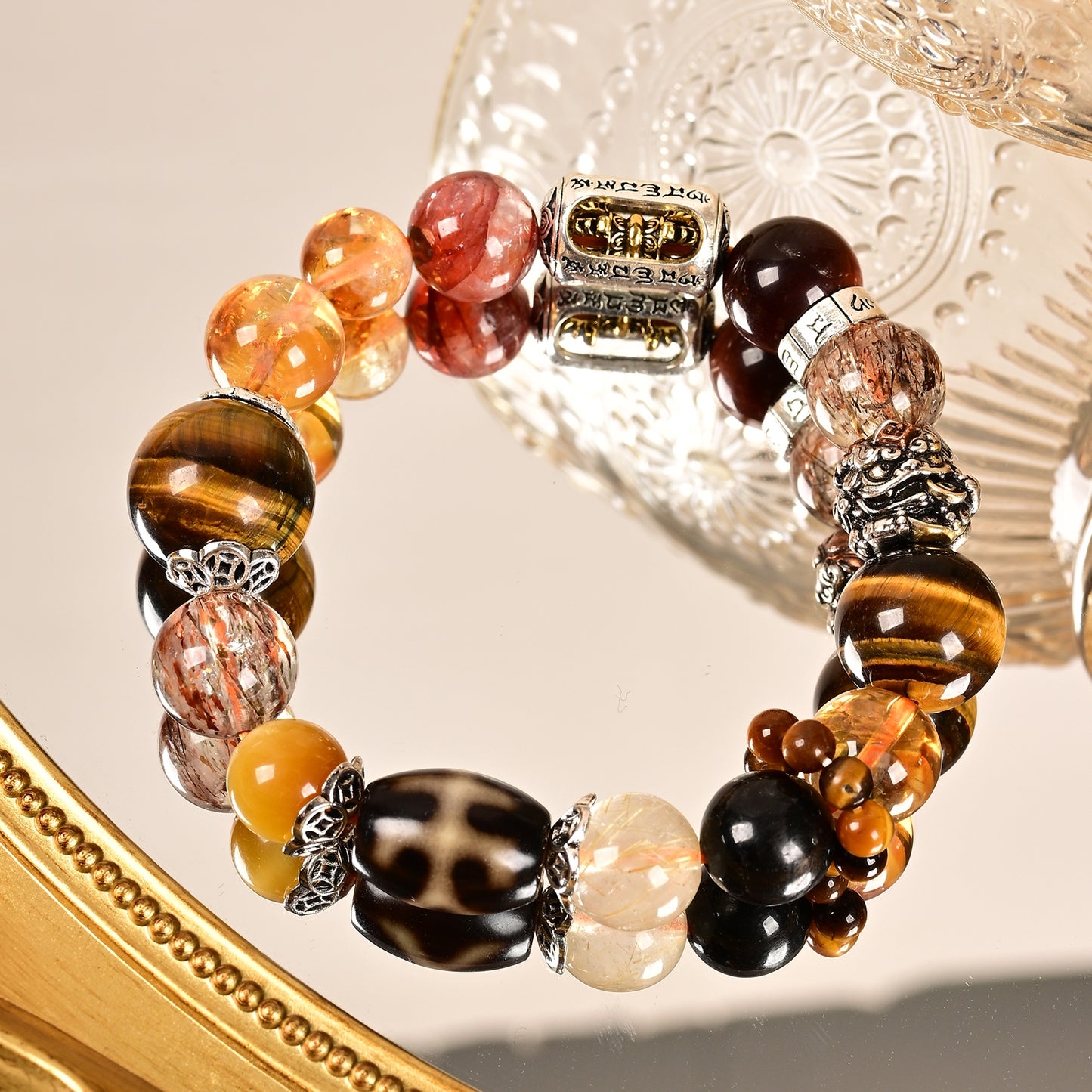 Tibetan black gold and super gold rutilated crystal multi-treasure design bracelet