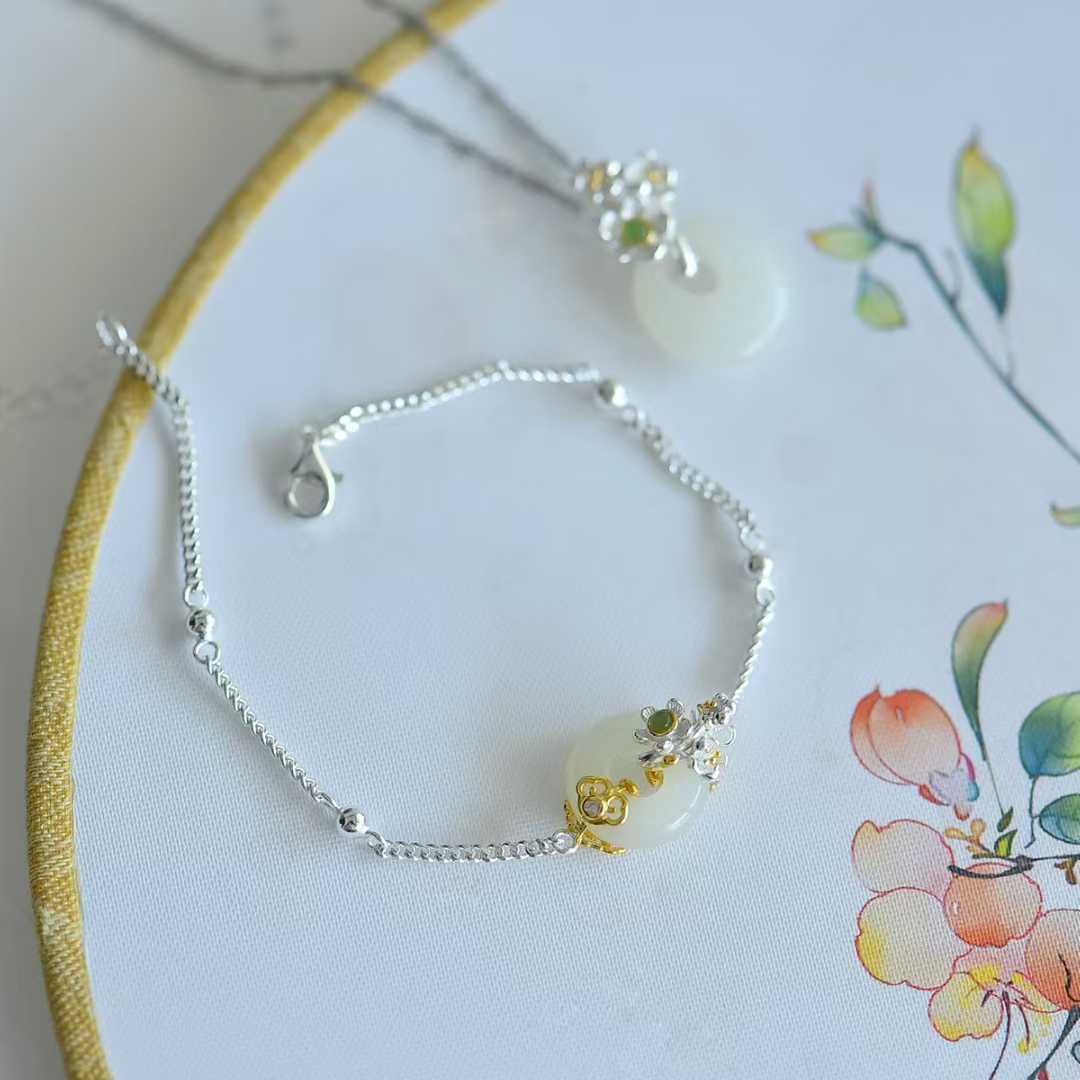 Traditional Chinese Hetian jade jewelry set - January plum blossom Flower God collection"