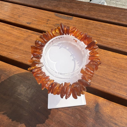 Sea drifting rough stone with the shape of the bracelet