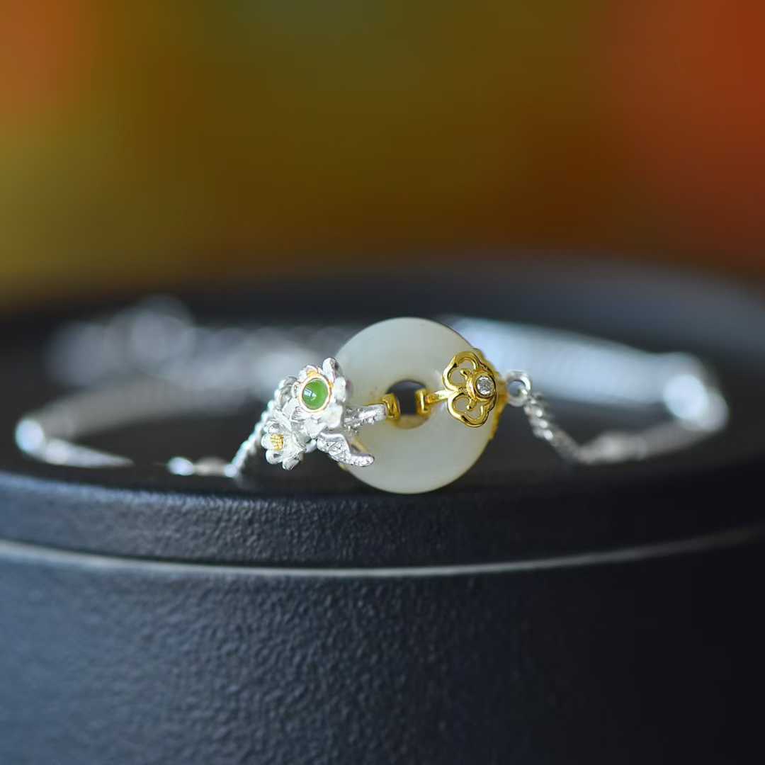 Close-up of lotus flower design Hetian jade pendant from Twelve Flower Gods series