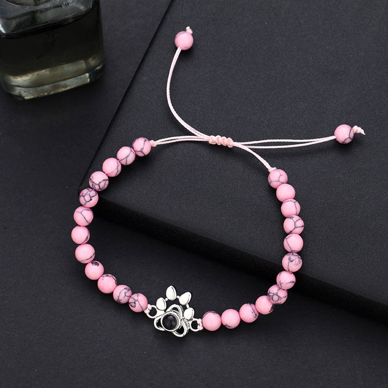 Pulsera con proyección de fotos y huella de perro