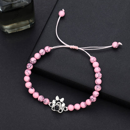 Pulsera con proyección de fotos y huella de perro