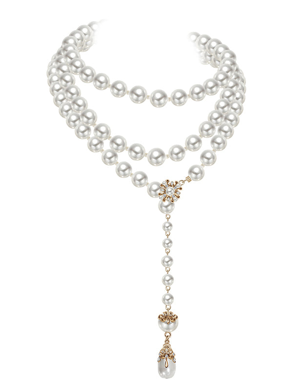 Long pearl necklace with multiple layers