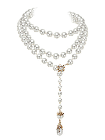 Long pearl necklace with multiple layers