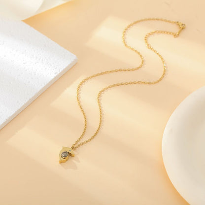 Side view of photo projection dolphin necklace - hidden photo inside
