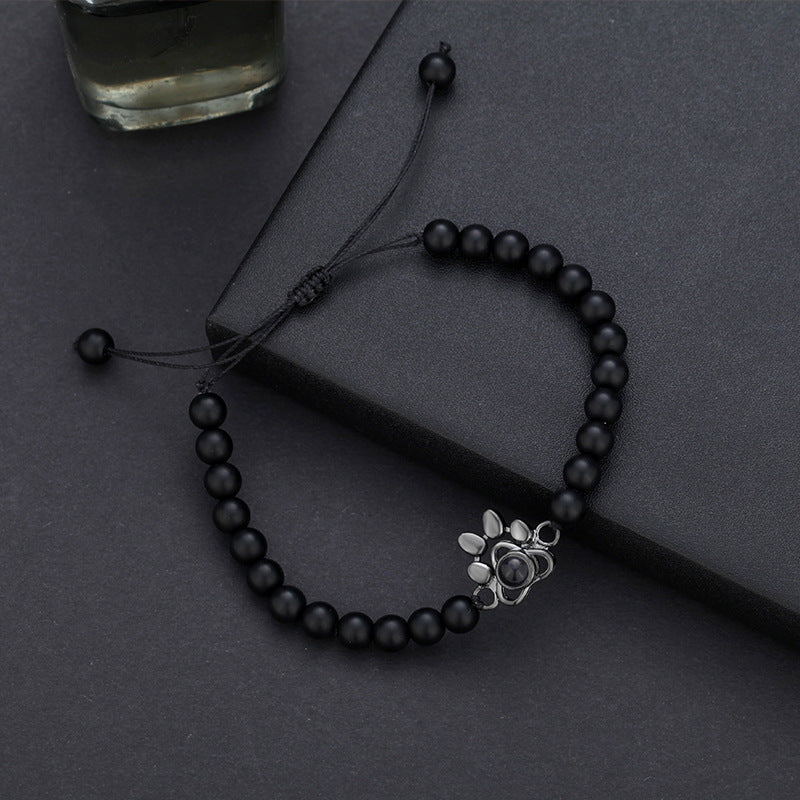 Pulsera con proyección de fotos y huella de perro