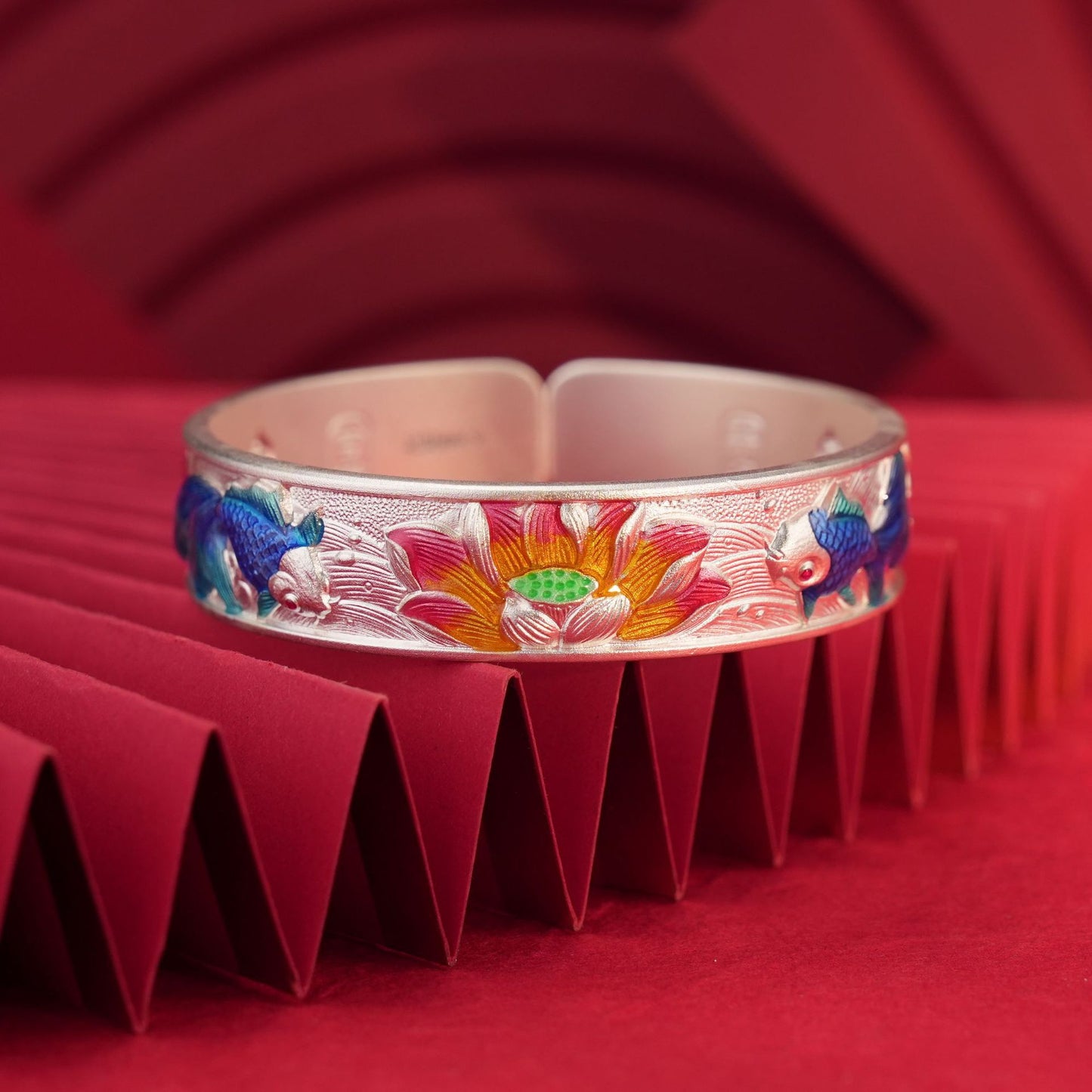 Detailed colored enamel Pisces fish design on sterling silver bracelet
