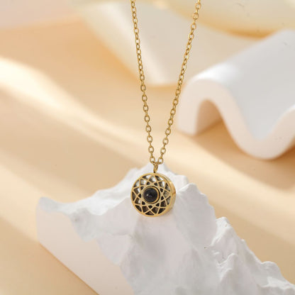 Side view of photo projection couple necklace - hidden photo inside
