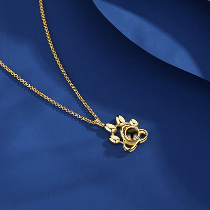 Photo projection dog paw necklace