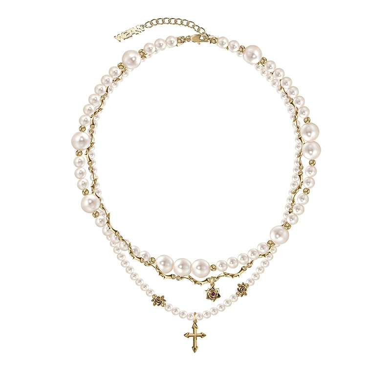 Baroque pearl cross necklace with layered chains