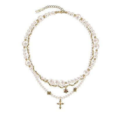 Baroque pearl cross necklace with layered chains