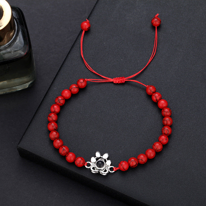 Pulsera con proyección de fotos y huella de perro