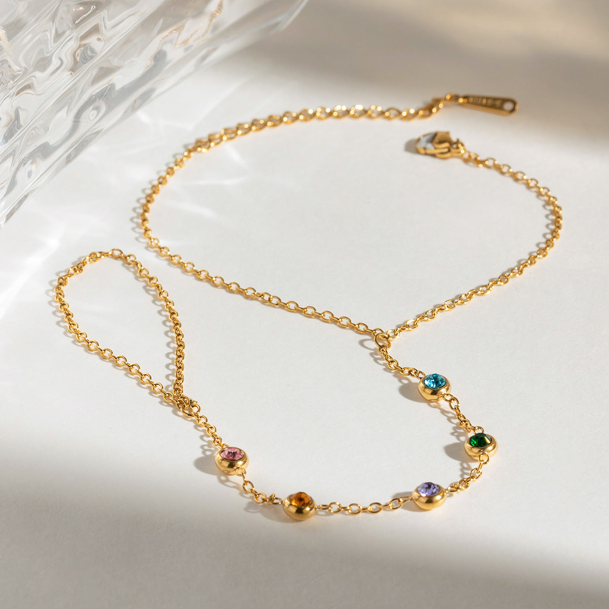 Colored zircon finger necklace