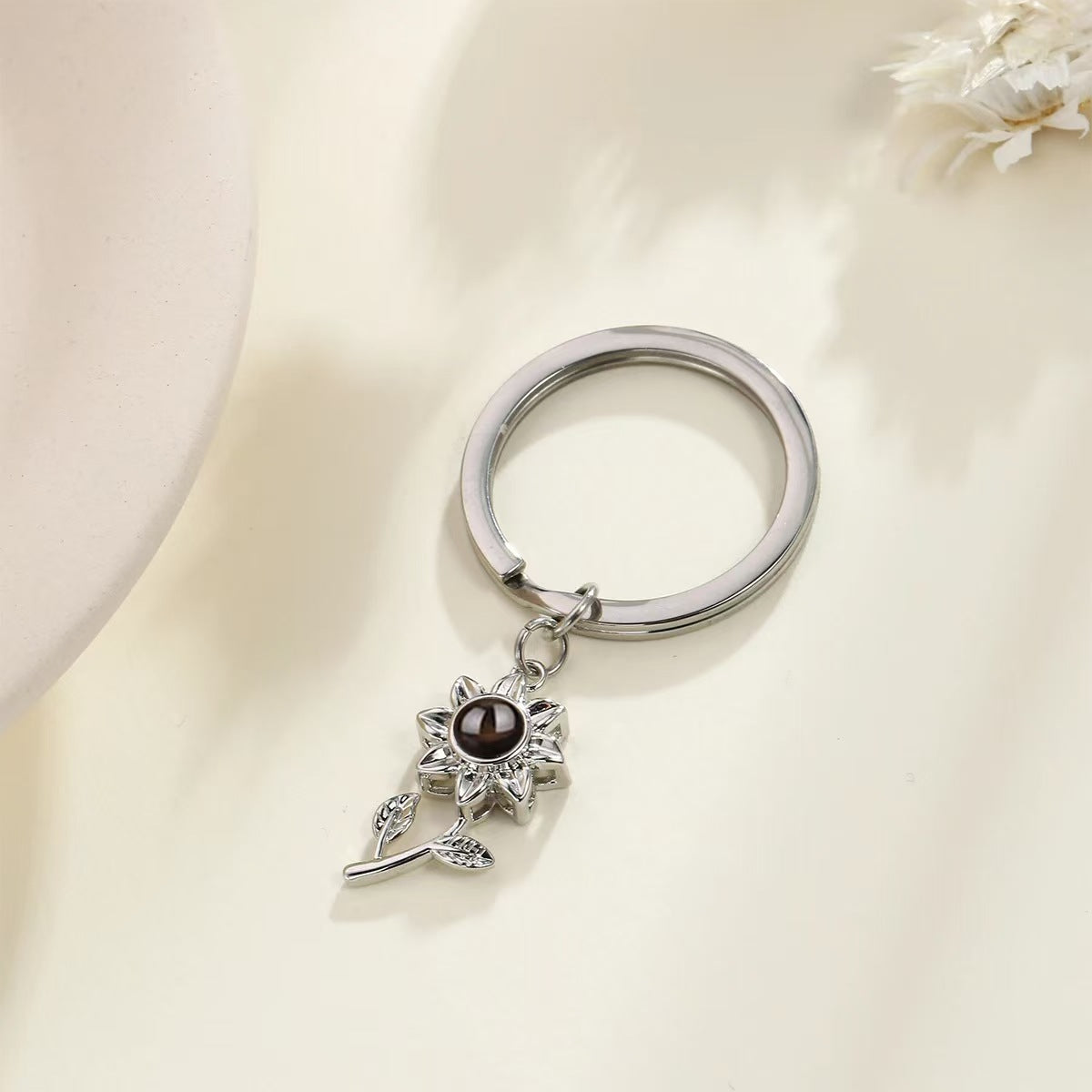 Collar de girasol con proyección de fotos