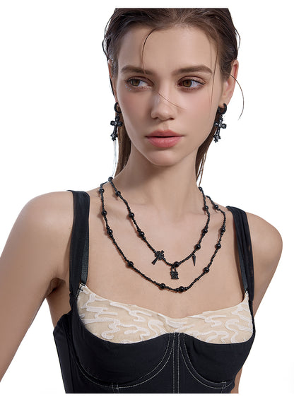 Cross necklace with multiple loops