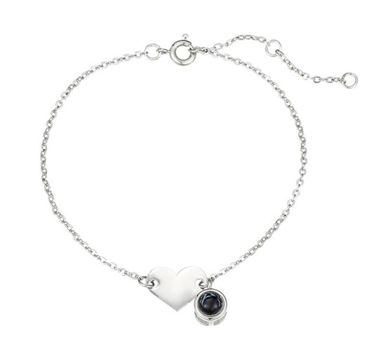 Heart-shaped engraved language projection bracelet
