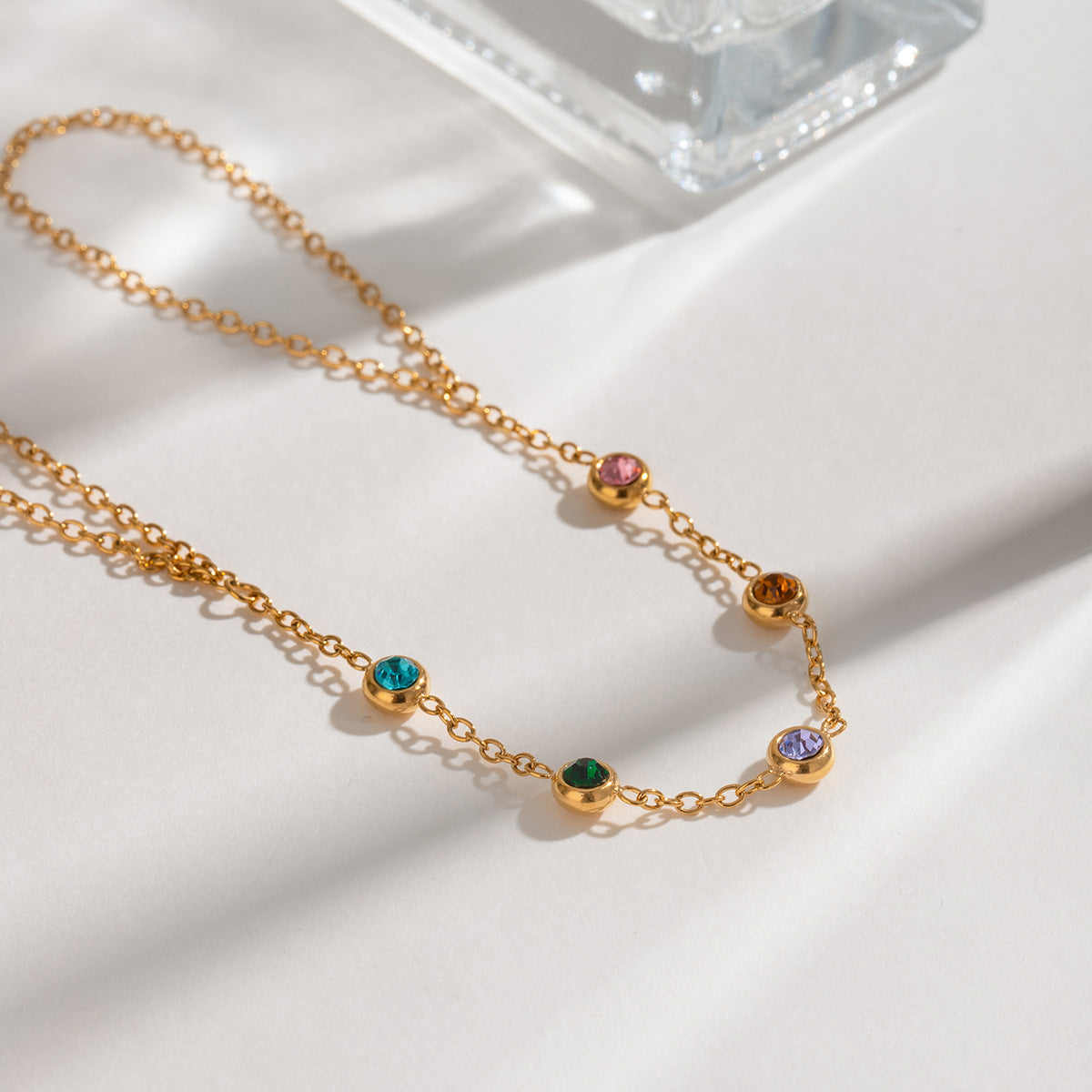 Colored zircon finger necklace