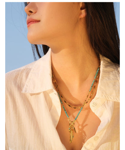 Basket of gold leaf necklace