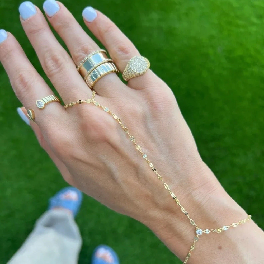 Delicate gold ring finger chain