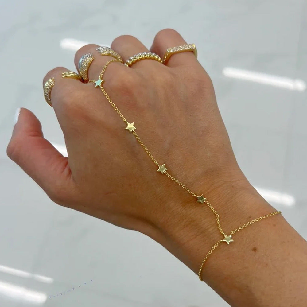 Delicate gold ring finger chain